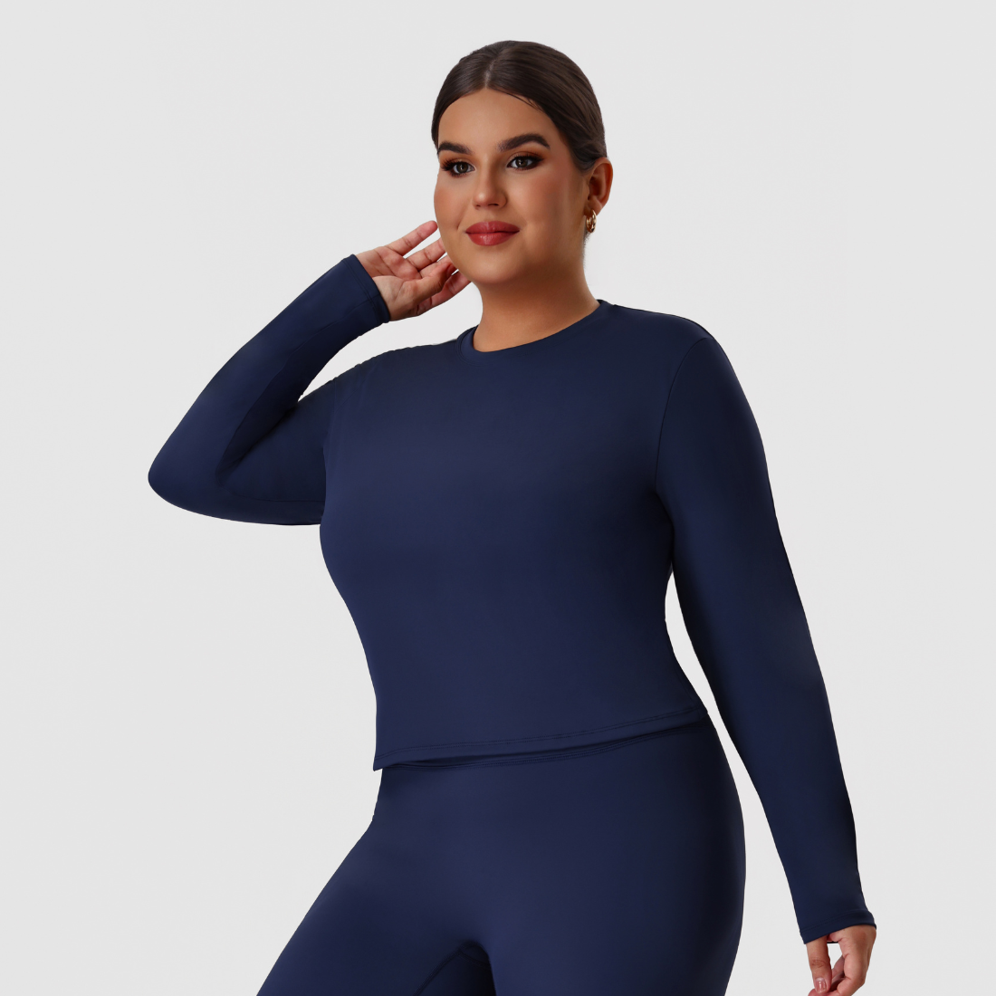 Plus size women's crew neck fitted long sleeve tee in navy blue