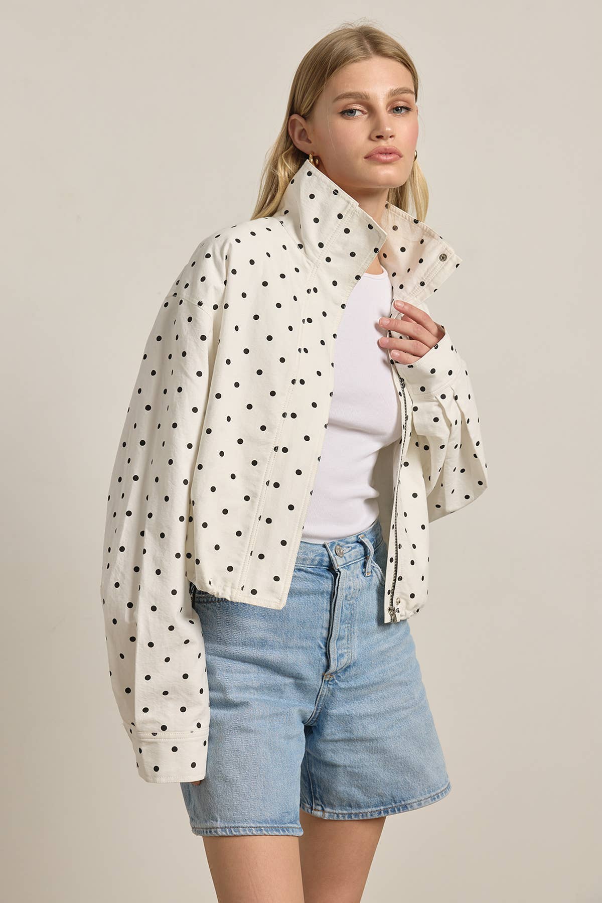 Polka Dot High Neck Drawstring Pullover Jacket in cream with black dots