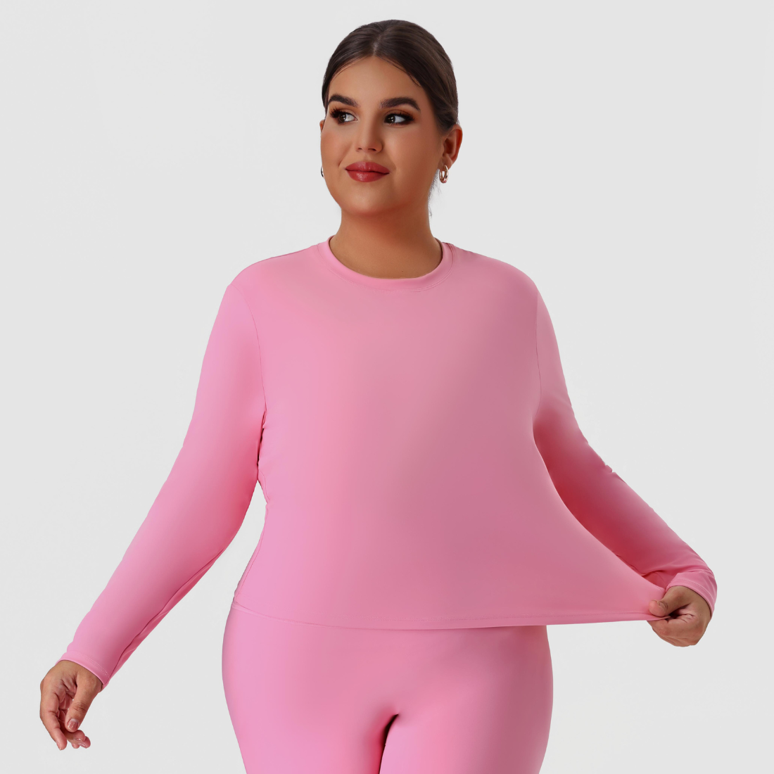 Plus size women's crew neck fitted long sleeve tee in pink