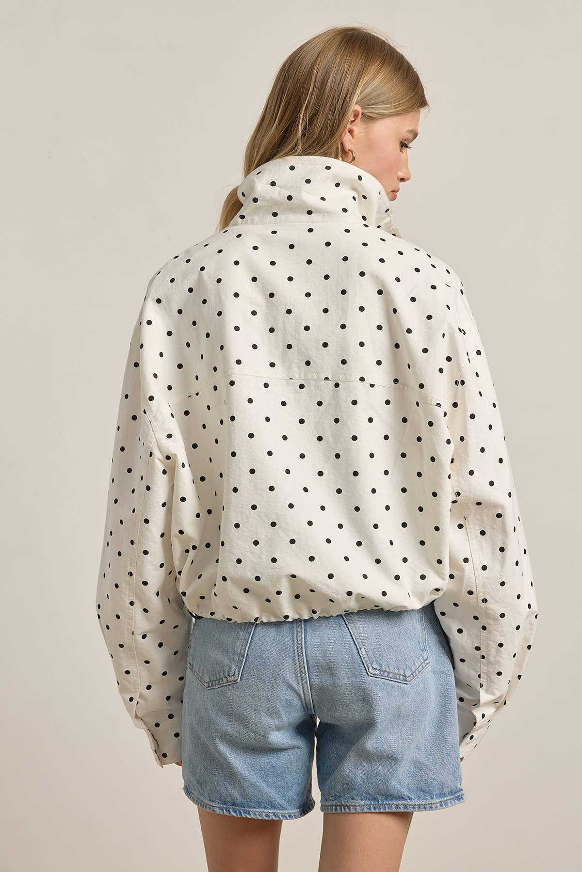 Polka Dot High Neck Drawstring Pullover Jacket in cream with black dots