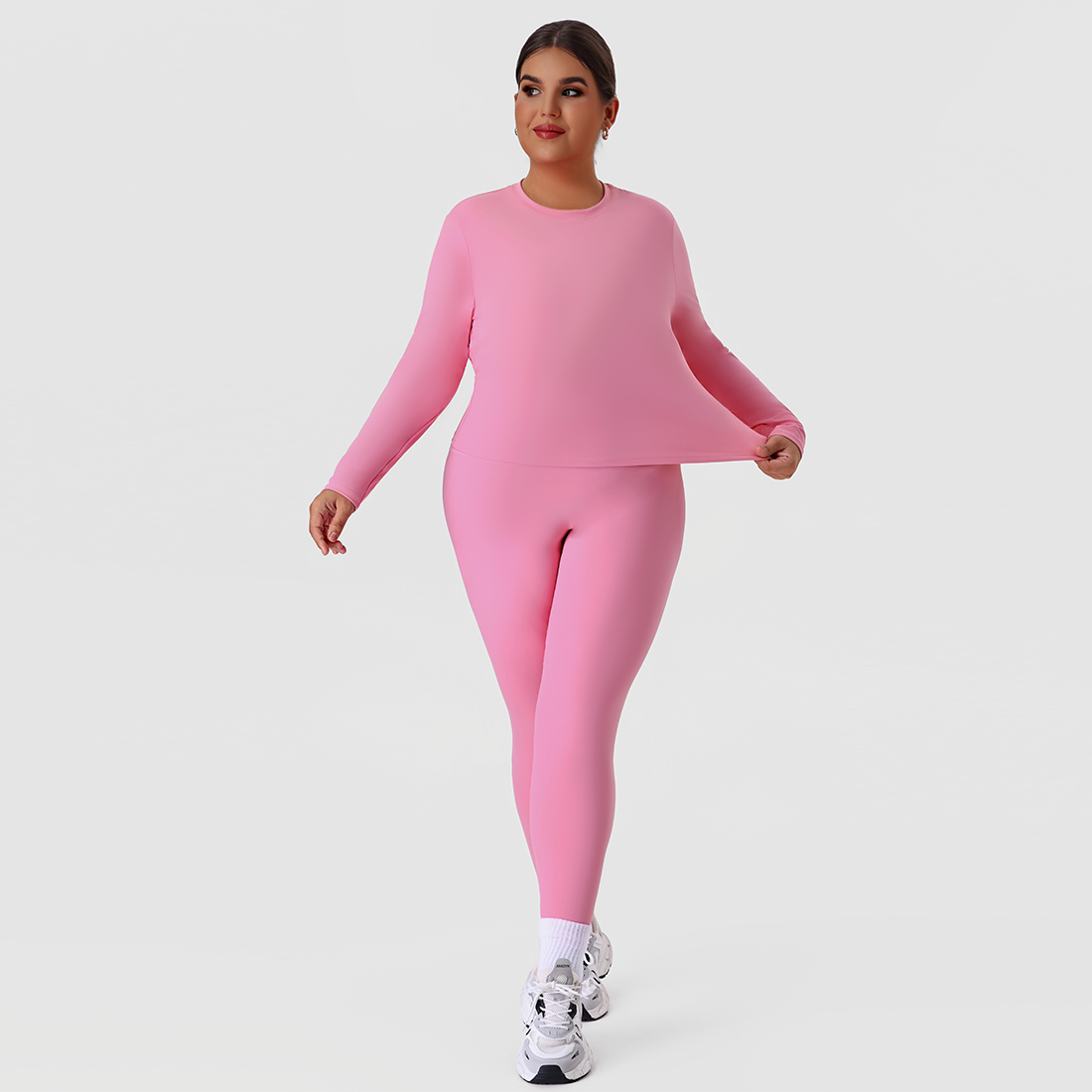 Plus size women's crew neck fitted long sleeve tee in pink