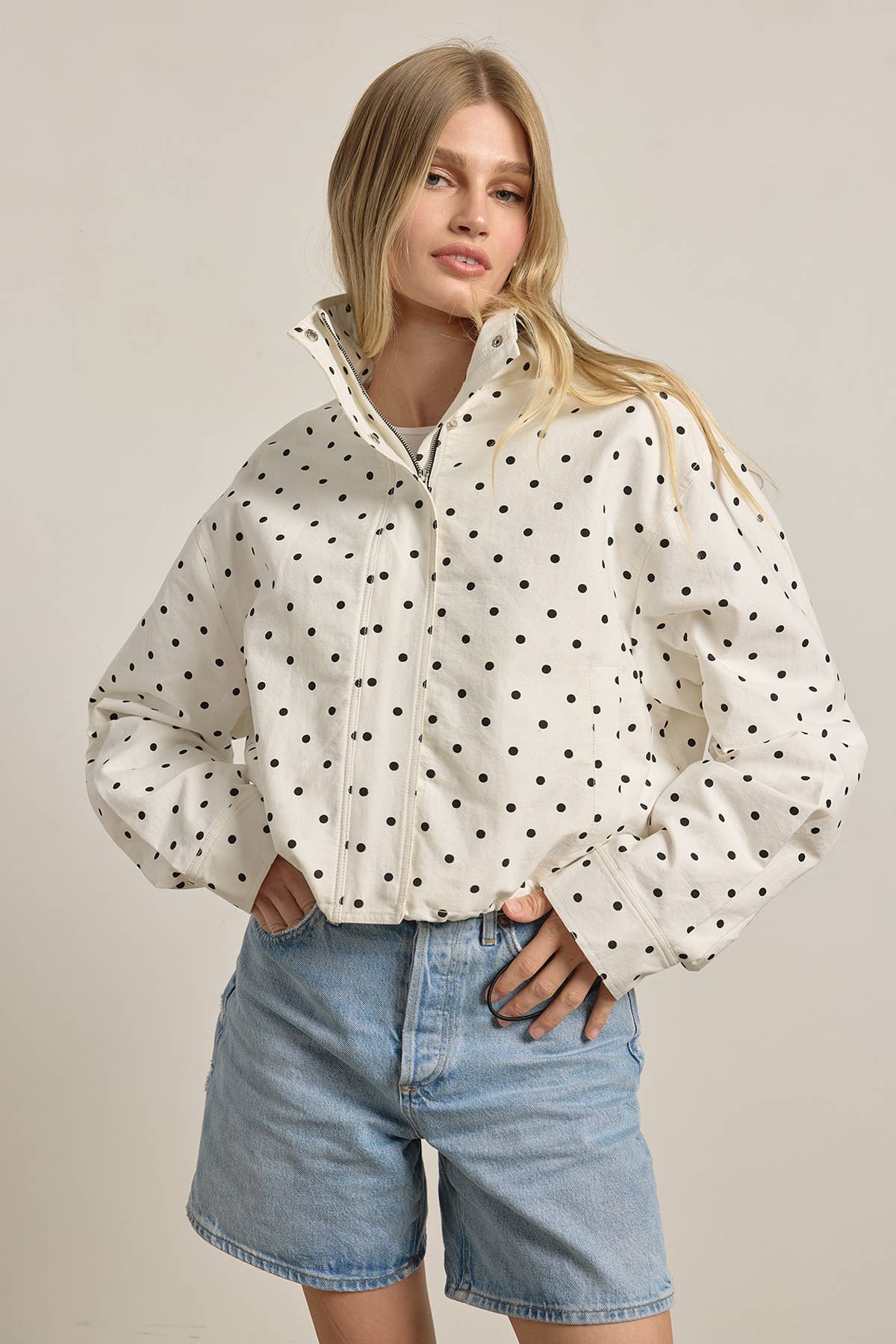Polka Dot High Neck Drawstring Pullover Jacket in cream with black dots