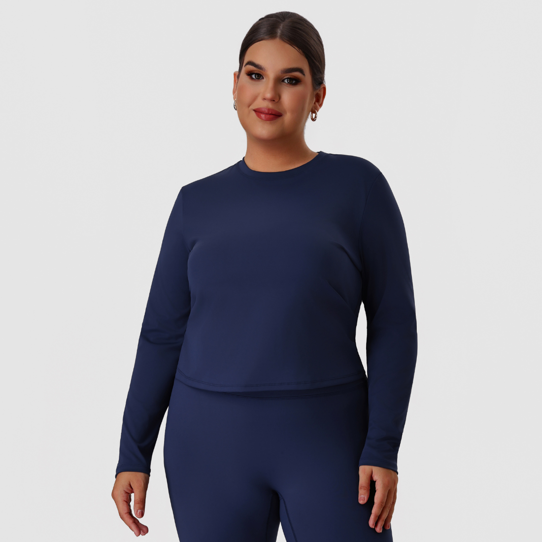 Plus size women's crew neck fitted long sleeve tee in navy blue