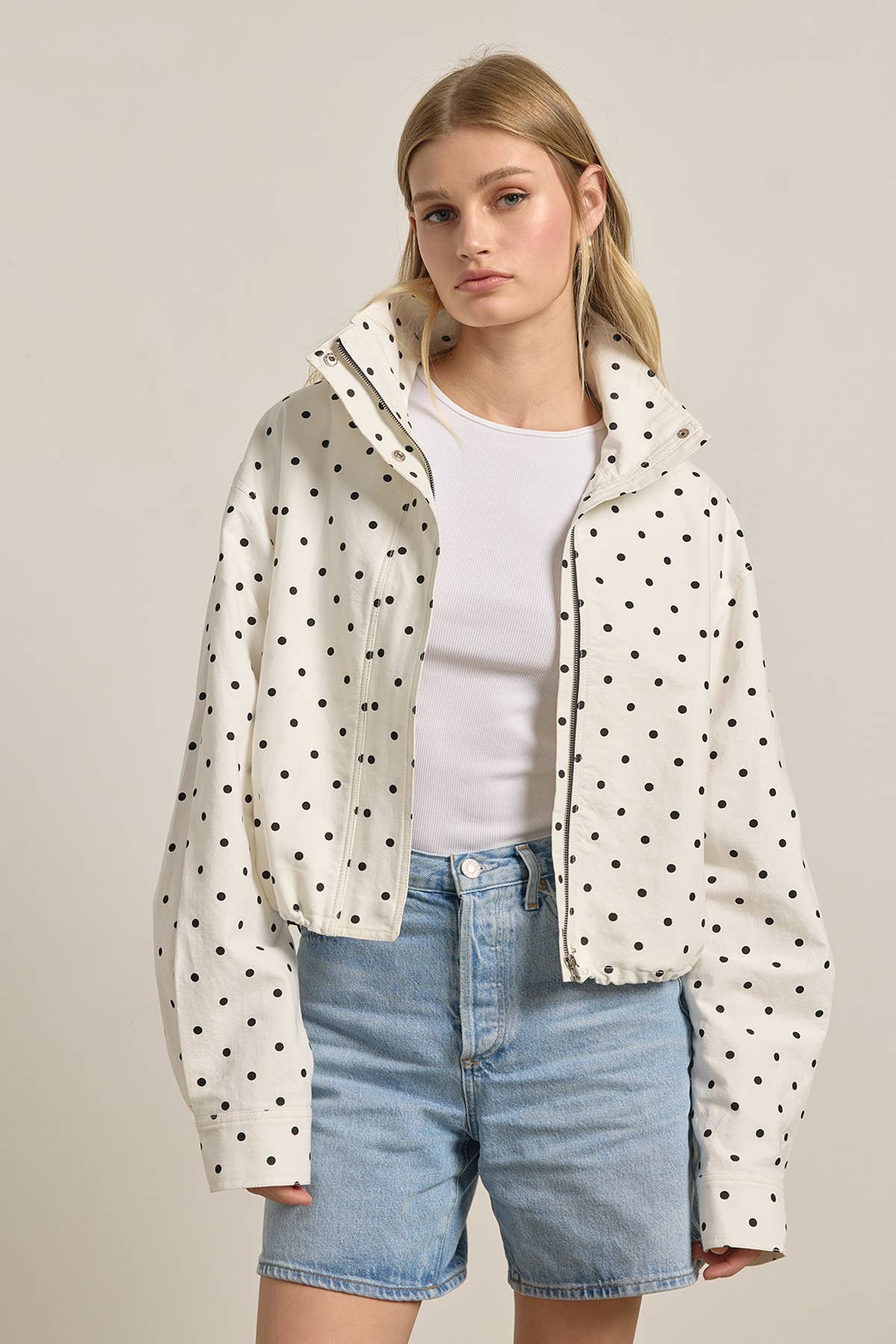 Polka Dot High Neck Drawstring Pullover Jacket in cream with black dots